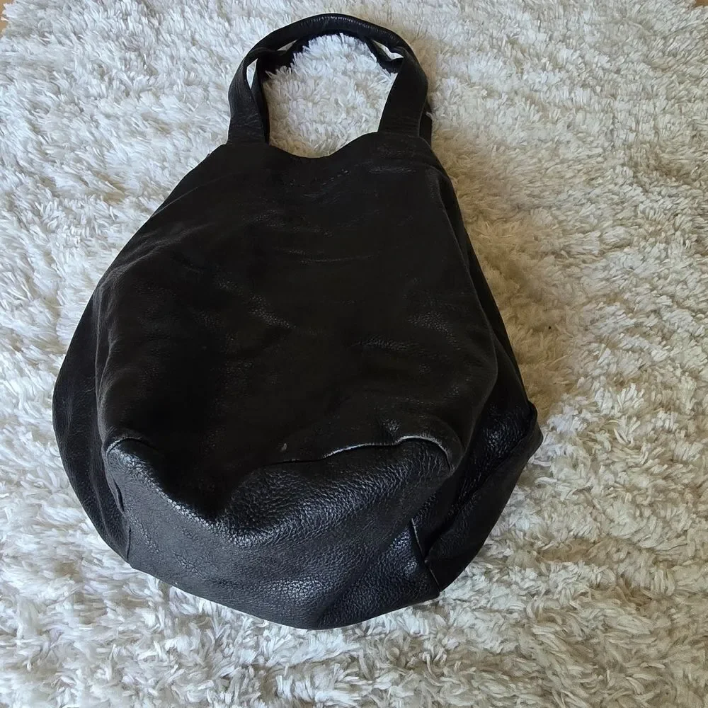 Neta Sade black leather‎ hobo purse.